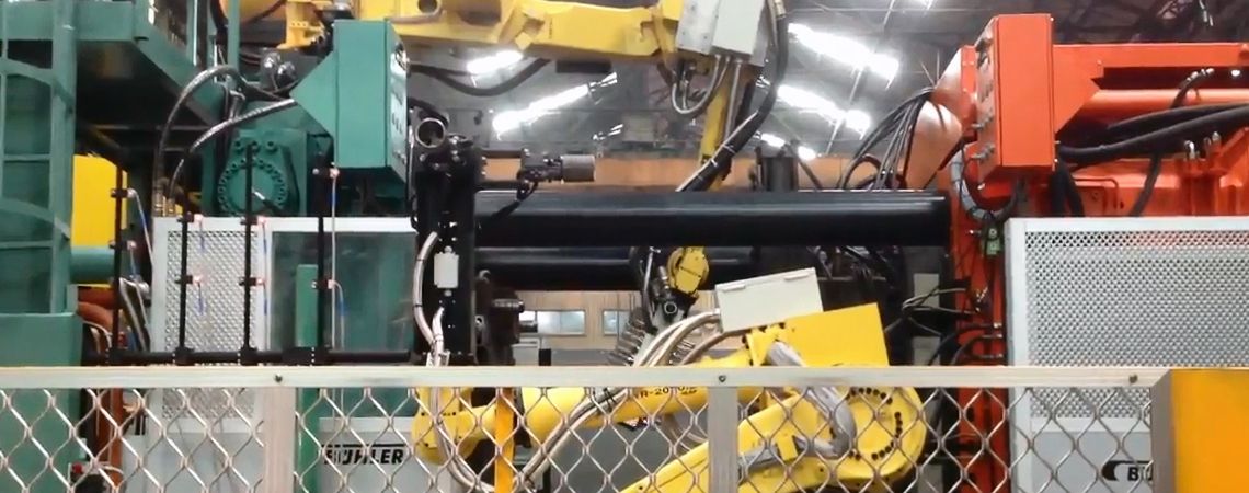 Spray per pressofusione con FANUC R2000iB / 165R & estrazione per pressofusione con FANUC R2000iB / 165F